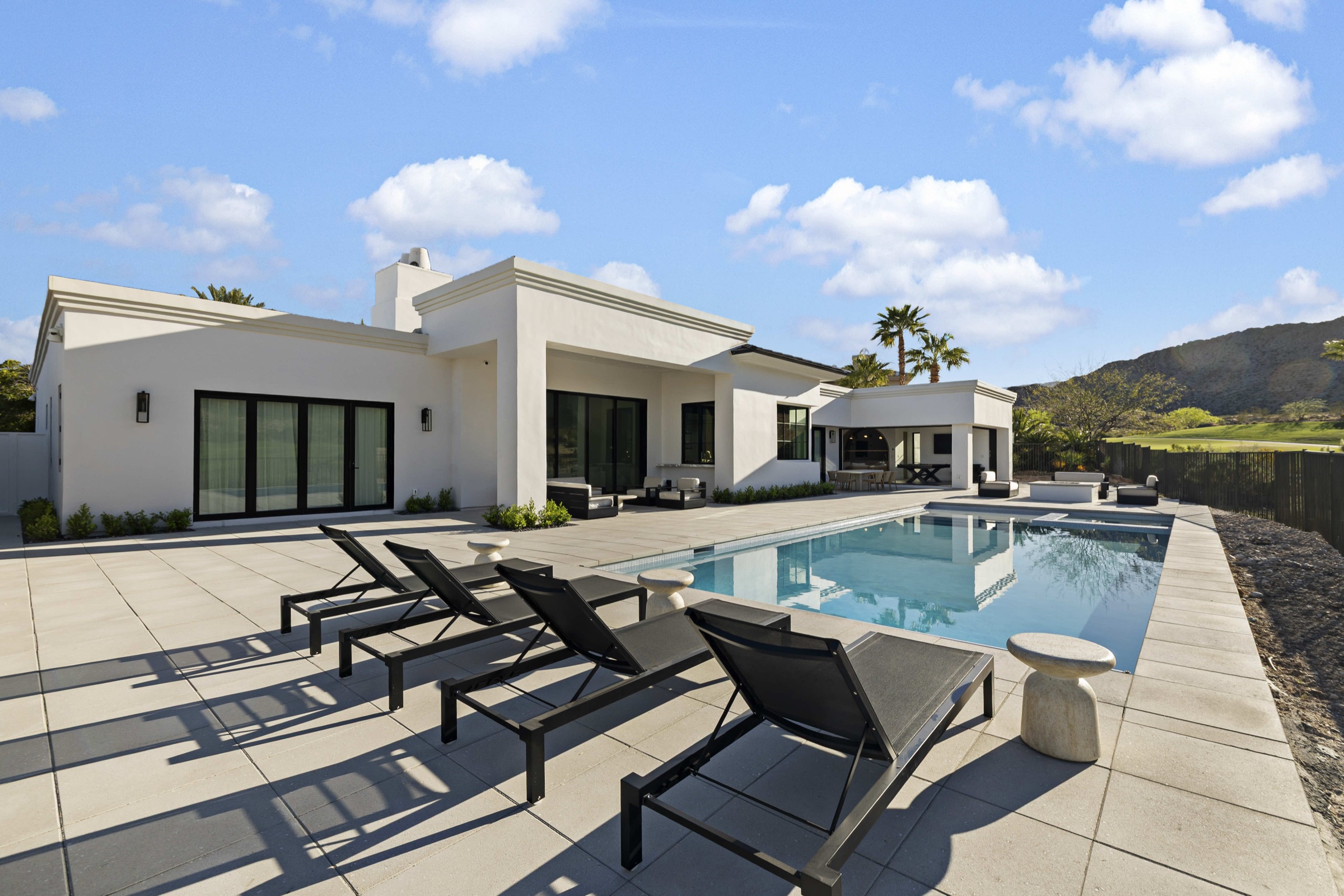 Custom home build-out with pool in Las Vegas, NV by C&M Home Designs
